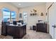 Bright home office with a large window and ample workspace at 7203 W Pacific Ave, Lakewood, CO 80227