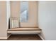 Charming window seat area with a comfortable cushioned bench, perfect for reading and relaxation by the natural light at 7203 W Pacific Ave, Lakewood, CO 80227