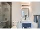 Modern bathroom with glass shower, sleek vanity, and contemporary fixtures at 1950 N Logan St # 411, Denver, CO 80203