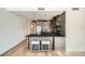 Stylish kitchen showcasing modern appliances, a breakfast bar, and sleek cabinetry, creating a functional space at 1950 N Logan St # 411, Denver, CO 80203
