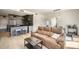 Open concept living area features kitchen, dining and comfortable seating at 1950 N Logan St # 411, Denver, CO 80203