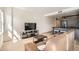 Inviting living area with hardwood floors, stainless steel appliances, and comfortable seating at 1950 N Logan St # 411, Denver, CO 80203