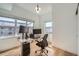 Bright office space with large windows, wood floors, and contemporary decor at 1950 N Logan St # 411, Denver, CO 80203