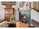 Fireplace area showcasing a modern fireplace, wooden accents, and stylish decor at 8872 E 47Th Ave, Denver, CO 80238
