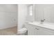 Bathroom with a white vanity, and toilet at 9032 Gale Blvd # 1, Thornton, CO 80260