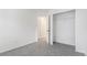 Cozy bedroom featuring neutral carpeting, and a door leading to the closet space at 9032 Gale Blvd # 1, Thornton, CO 80260