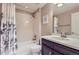 Cozy bathroom featuring a shower-over-tub combination and a white vanity with a mirror at 4545 S Monaco St # 436, Denver, CO 80237