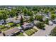 Aerial view of a neighborhood featuring tree-lined streets and well-maintained homes at 7350 Dale Ct, Westminster, CO 80030