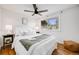 Bright bedroom with hardwood floors, a comfortable bed, and simple decor at 7350 Dale Ct, Westminster, CO 80030