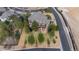 An aerial view of the property highlighting mature trees, deck, and landscaping at 12161 S Leaning Pine Ct, Parker, CO 80134