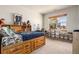 Comfortable bedroom with natural light, carpet flooring, and closet at 12161 S Leaning Pine Ct, Parker, CO 80134