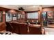 Home Theater featuring leather reclining chairs, projector and screen at 12161 S Leaning Pine Ct, Parker, CO 80134