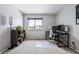 Bedroom with carpet, a window providing natural light, and space for a desk at 2557 S Dover St # 30, Lakewood, CO 80227
