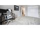 Bedroom with carpet, a window providing natural light, a chair, and space for a desk at 2557 S Dover St # 30, Lakewood, CO 80227