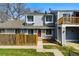 Charming townhouse with a well-maintained lawn, and classic architectural details at 2557 S Dover St # 30, Lakewood, CO 80227