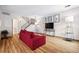 Bright living room boasting hardwood floors, a modern staircase and comfortable seating at 2557 S Dover St # 30, Lakewood, CO 80227