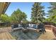 Staged back deck area with patio furniture and landscaping at 4267 Ashcroft Ave, Castle Rock, CO 80104