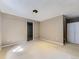 Finished basement area with carpeted floors, a closet, and a doorway leading to unfinished space at 4267 Ashcroft Ave, Castle Rock, CO 80104