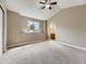 Bedroom with ceiling fan and view of ensuite bathroom at 4267 Ashcroft Ave, Castle Rock, CO 80104