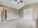 Bedroom with ample closet space, soft carpet, and neutral walls providing a cozy atmosphere at 4267 Ashcroft Ave, Castle Rock, CO 80104