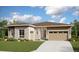 Beautiful single-story home featuring a stone facade, attached two-car garage, and well-manicured lawn at 24751 E 38Th Ave, Aurora, CO 80019