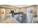 A ping pong table in the finished basement recreation room perfect for social gatherings and active entertainment at 15635 Dawson Creek Dr, Monument, CO 80132