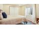 Bedroom featuring a comfortable bed, a closet, and natural light at 15635 Dawson Creek Dr, Monument, CO 80132