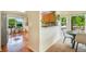 Open concept eat-in kitchen with a view into the dining area at 15635 Dawson Creek Dr, Monument, CO 80132
