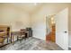 Home office with wood floors, a desk, and natural light at 15635 Dawson Creek Dr, Monument, CO 80132