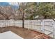 A delightful back yard featuring a classic white picket fence and ample space at 1336 Sable Blvd, Aurora, CO 80011