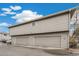 Exterior view of a garage with two bays, providing ample parking and storage at 1336 Sable Blvd, Aurora, CO 80011