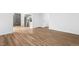 Living room featuring wood floors, stainless appliances and lots of natural light at 1336 Sable Blvd, Aurora, CO 80011