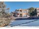 Exterior view of the building showing the backyard and landscaping at 7440 S Blackhawk St # 12-201, Englewood, CO 80112