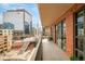 City view from a balcony of brick apartments at 1590 Little Raven St # 702, Denver, CO 80202