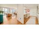 Open concept living space featuring city views, hardwood floors and modern kitchen at 1590 Little Raven St # 702, Denver, CO 80202
