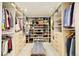 Organized walk-in closet with custom shelving, drawers, and ample storage space at 1590 Little Raven St # 702, Denver, CO 80202