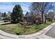 Attractive single-story home with a brick exterior and mature trees on a corner lot at 1400 E Bates Ave, Englewood, CO 80113