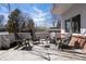 Comfortable patio area featuring seating, perfect for outdoor entertaining or relaxing in the sun at 1400 E Bates Ave, Englewood, CO 80113