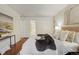 Bedroom with hardwood flooring and ensuite bathroom at 8335 Fairmount Dr # 5-106, Denver, CO 80247