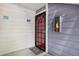 Front door of condo unit with visible unit number and nearby fire extinguisher at 8335 Fairmount Dr # 5-106, Denver, CO 80247