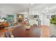 Open floor plan showcasing the living room, dining area, and kitchen with modern appliances at 8335 Fairmount Dr # 5-106, Denver, CO 80247