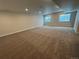 Unfinished basement with neutral carpet and recessed lighting at 5503 Riverbend Ave, Firestone, CO 80504