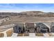 An aerial view of the house and the surrounding neighborhood with convenient access to the highway at 2464 Garganey Dr, Castle Rock, CO 80104