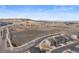 An aerial view of the home and the surrounding area, featuring a park with a soccer field at 2464 Garganey Dr, Castle Rock, CO 80104