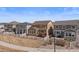 View of the backyard with a deck and white fence surrounding the yard at 2464 Garganey Dr, Castle Rock, CO 80104