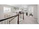 Bonus room on second floor with carpeted floors, shelves, and natural lighting at 2464 Garganey Dr, Castle Rock, CO 80104