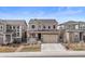 Beautiful two-story home with a manicured lawn and inviting front porch at 2464 Garganey Dr, Castle Rock, CO 80104