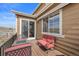 Covered patio area with furniture with views of the green space at 2464 Garganey Dr, Castle Rock, CO 80104