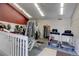 A modern gym features weights, treadmills, and other machines for a full workout at 7665 E Eastman Ave # 104A, Denver, CO 80231
