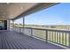 Spacious back deck with lovely views of the green fields, perfect for outdoor living and entertaining at 14337 Shasta Daisy Pt, Parker, CO 80134